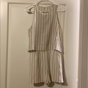 White romper with navy blue stripes
